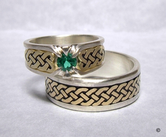 Silver and Yellow Gold Celtic Heart Shield Rings, flush set with a .50ct Emerald
